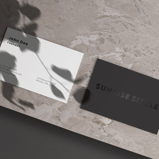 Spot UV business cards feature a glossy, raised coating applied to specific areas, creating a striking contrast with the matte finish. They add elegance and sophistication to your business card design.
